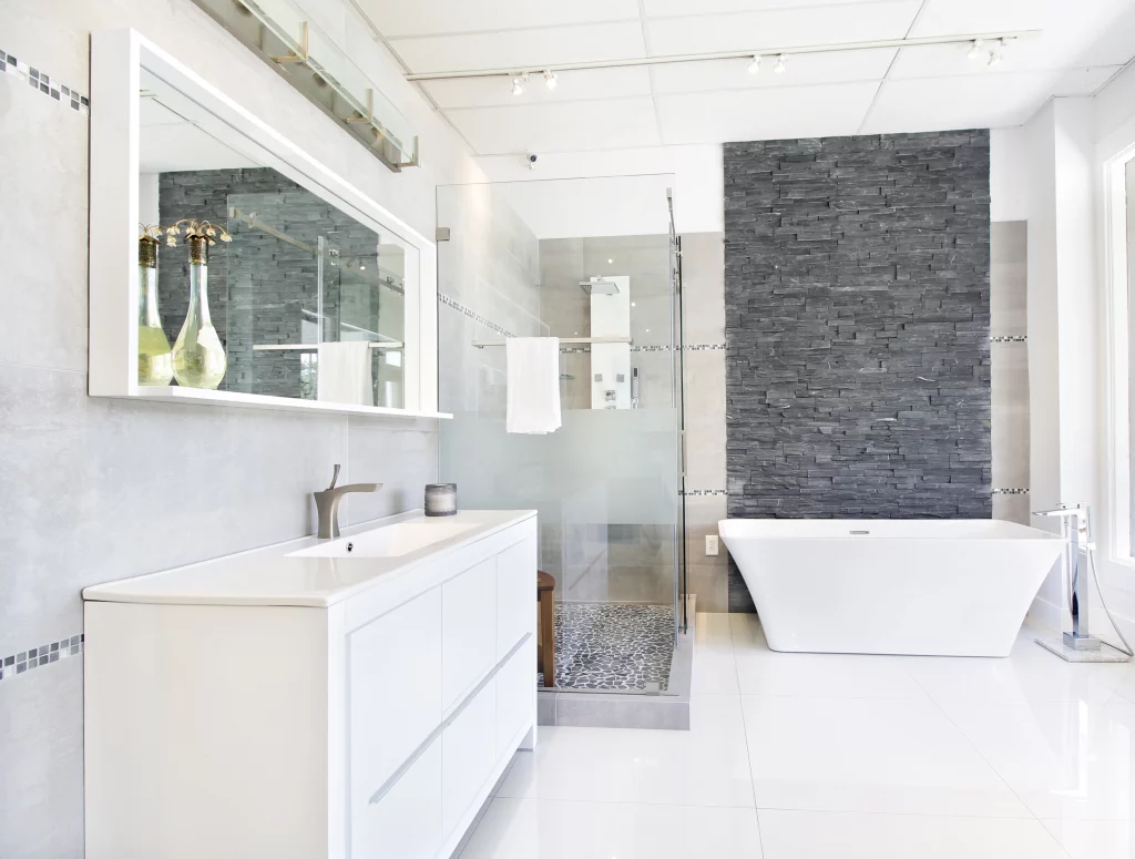 Luxury master bathroom remodel in South Florida with frameless glass and custom vanity.